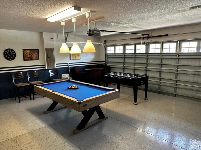 1439 Moon Valley Dr, Davenport, FL 33896 - game room featuring billiards table, speckled floor, a textured ceiling, and electric panel