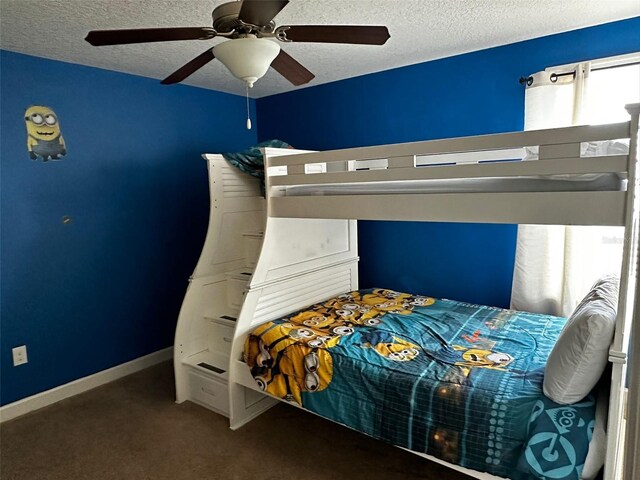1439 Moon Valley Dr, Davenport, FL 33896 - carpeted bedroom featuring a textured ceiling, ceiling fan, and baseboards