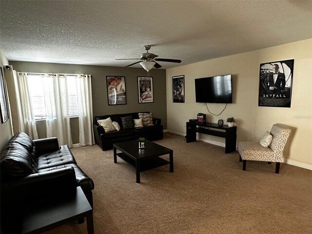 1439 Moon Valley Dr, Davenport, FL 33896 - carpeted living area with a ceiling fan, a textured ceiling, and baseboards
