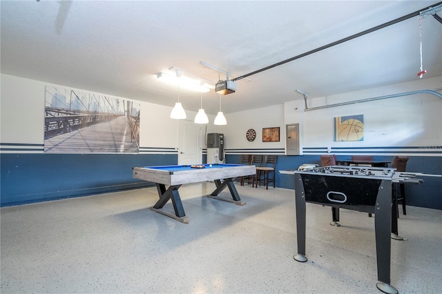 1439 Moon Valley Dr, Davenport, FL 33896 - rec room with speckle patterned floor, billiards, and a garage
