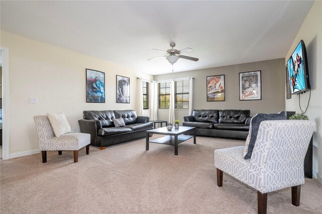 1439 Moon Valley Dr, Davenport, FL 33896 - living area with light colored carpet and a ceiling fan