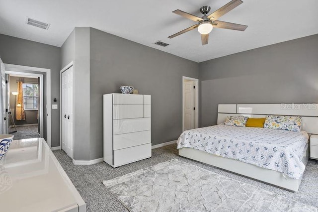 17516 Blessing Dr, Clermont, FL 34714 - carpeted bedroom featuring baseboards, ceiling fan, and a closet