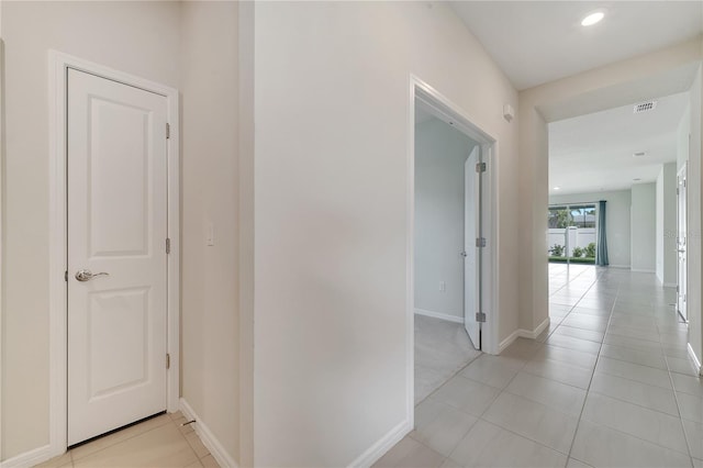 2578 Cliff Way, Saint Cloud, FL 34771 - hall with baseboards, light tile patterned flooring, and recessed lighting