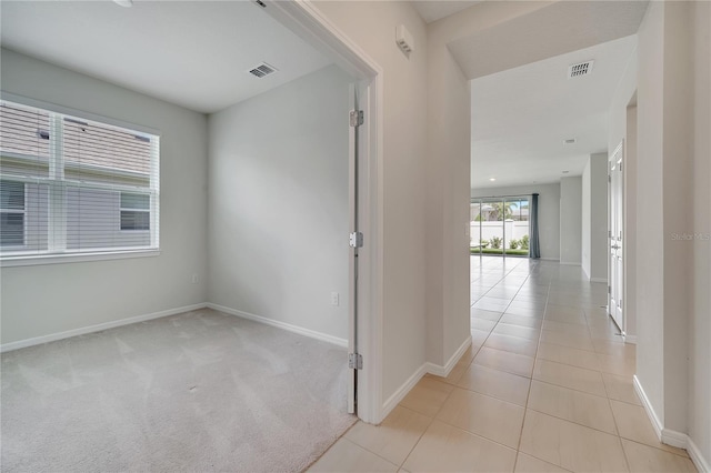 2578 Cliff Way, Saint Cloud, FL 34771 - corridor featuring baseboards and light tile patterned floors