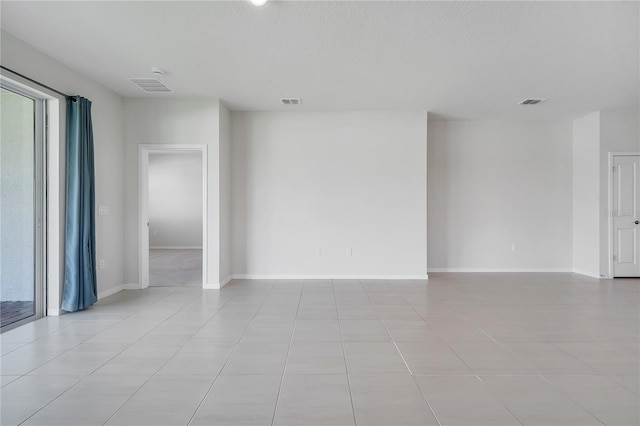 2578 Cliff Way, Saint Cloud, FL 34771 - spare room with light tile patterned floors and baseboards
