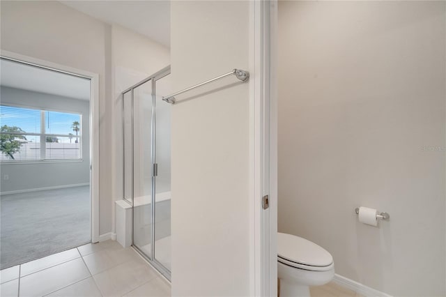 2578 Cliff Way, Saint Cloud, FL 34771 - full bath with toilet, a shower stall, tile patterned flooring, and baseboards
