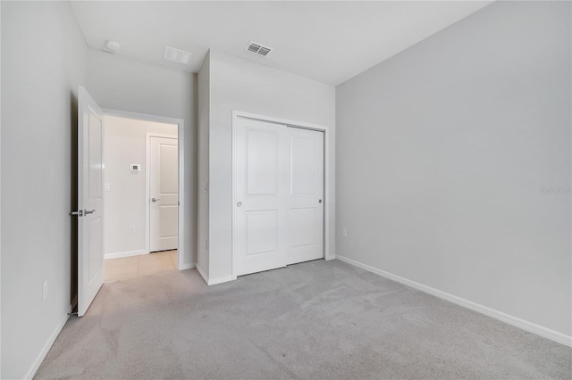 2578 Cliff Way, Saint Cloud, FL 34771 - unfurnished bedroom featuring carpet flooring, baseboards, and a closet