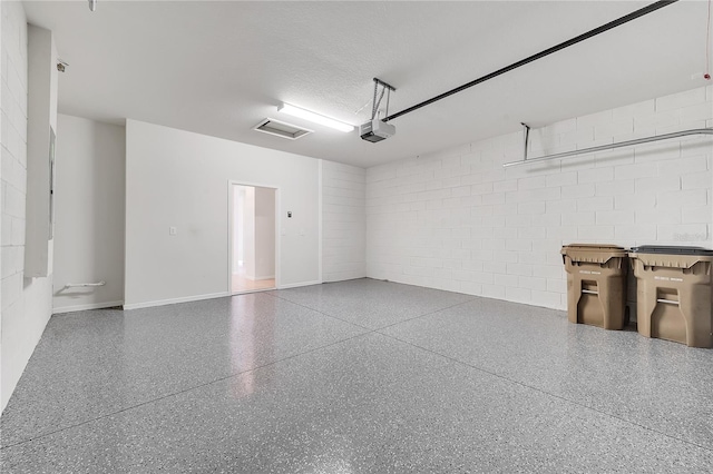 2578 Cliff Way, Saint Cloud, FL 34771 - garage with a garage door opener and concrete block wall