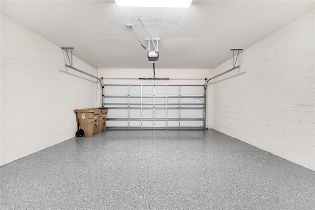 2578 Cliff Way, Saint Cloud, FL 34771 - garage featuring concrete block wall and a garage door opener