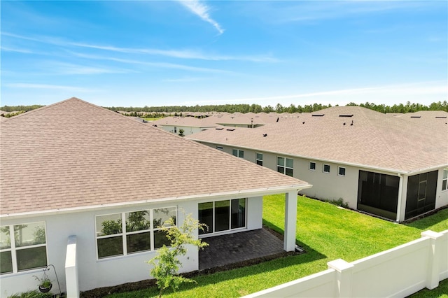 2578 Cliff Way, Saint Cloud, FL 34771 - rear view of house with roof with shingles, stucco siding, a patio, and a sunroom
