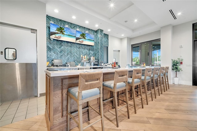 2578 Cliff Way, Saint Cloud, FL 34771 - indoor wet bar with recessed lighting, light wood finished floors, backsplash, and baseboards