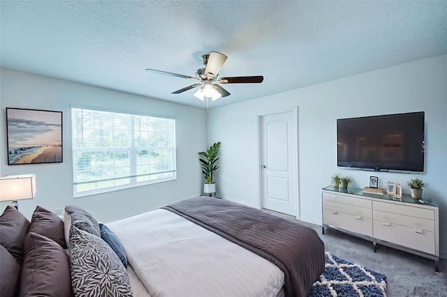 1303 Congo Ct, Kissimmee, FL 34759 - carpeted bedroom with a ceiling fan and baseboards