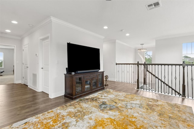9844 Beach Port Dr, Winter Garden, FL 34787 - living room featuring wood finished floors, recessed lighting, baseboards, crown molding, and a chandelier