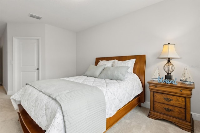 9844 Beach Port Dr, Winter Garden, FL 34787 - bedroom with light carpet and baseboards