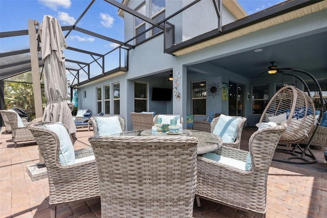 9844 Beach Port Dr, Winter Garden, FL 34787 - view of patio featuring a ceiling fan, outdoor dining space, and a lanai