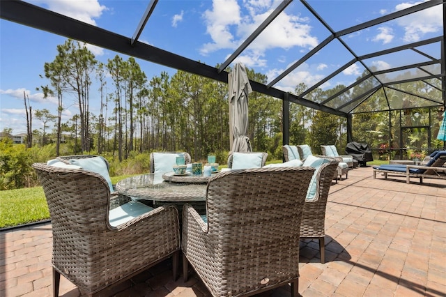 9844 Beach Port Dr, Winter Garden, FL 34787 - view of patio with glass enclosure and outdoor dining area
