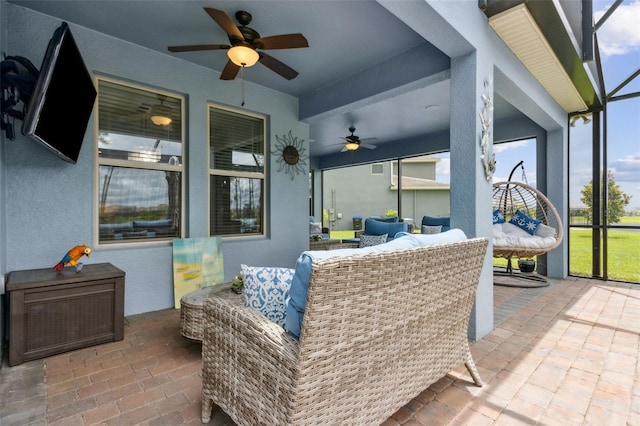 9844 Beach Port Dr, Winter Garden, FL 34787 - sunroom / solarium featuring a ceiling fan and an outdoor living space
