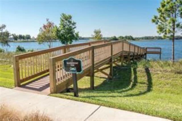 9844 Beach Port Dr, Winter Garden, FL 34787 - view of community featuring a water view and a lawn