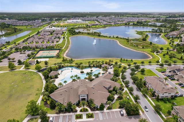 9844 Beach Port Dr, Winter Garden, FL 34787 - aerial overview of property's location with a large body of water, nearby suburban area, and a pool area