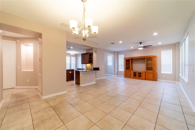 3651 NW 56th Ave, Ocala, FL 34482 - unfurnished living room featuring light tile patterned floors, recessed lighting, a chandelier, baseboards, and ceiling fan