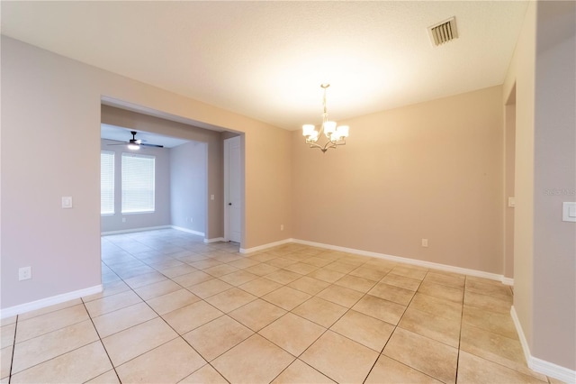 3651 NW 56th Ave, Ocala, FL 34482 - unfurnished room with a chandelier, light tile patterned floors, baseboards, and ceiling fan