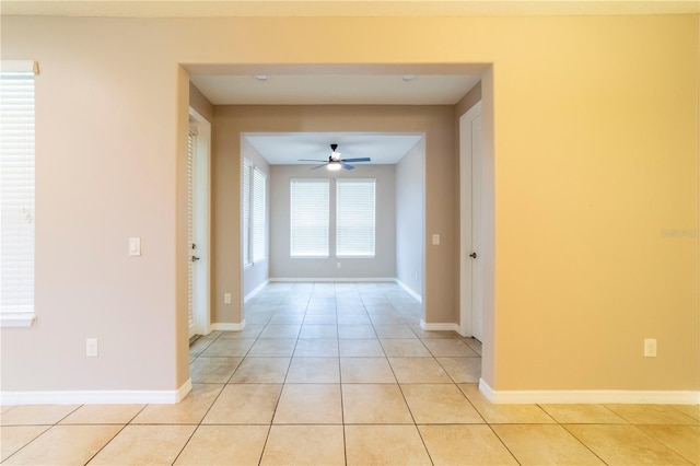 3651 NW 56th Ave, Ocala, FL 34482 - hallway with light tile patterned floors and baseboards