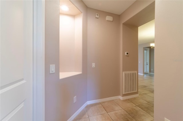 3651 NW 56th Ave, Ocala, FL 34482 - corridor with tile patterned floors and baseboards