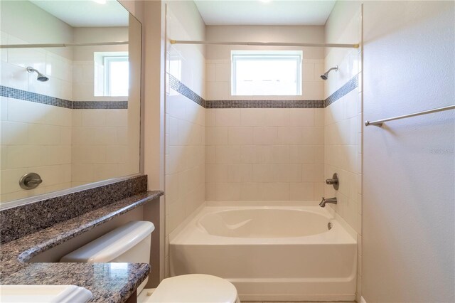 3651 NW 56th Ave, Ocala, FL 34482 - bathroom featuring washtub / shower combination, toilet, and vanity
