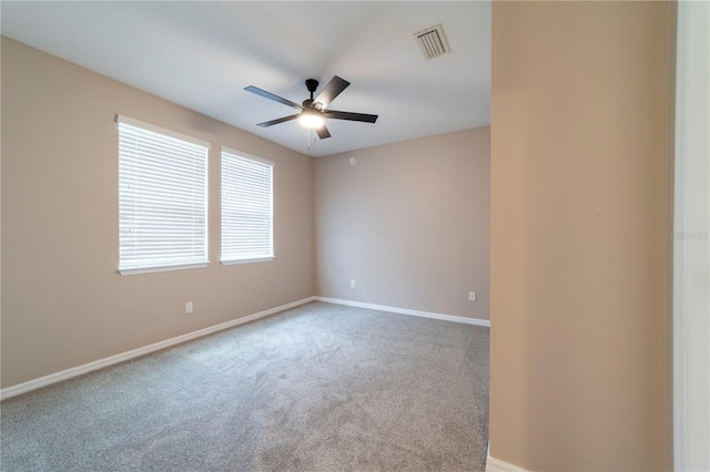 3651 NW 56th Ave, Ocala, FL 34482 - spare room featuring a ceiling fan, carpet floors, and baseboards