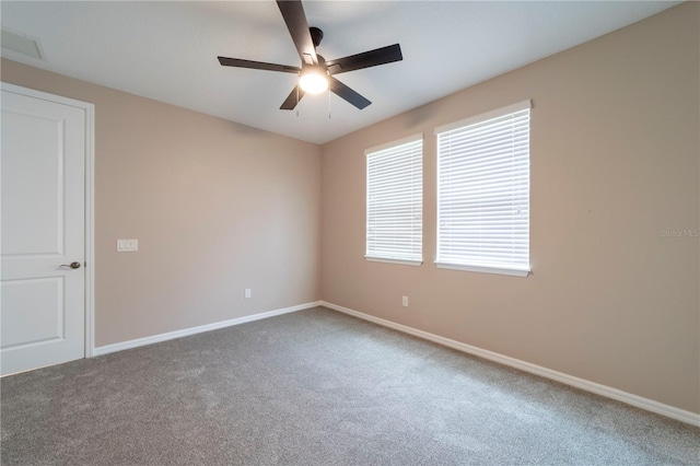 3651 NW 56th Ave, Ocala, FL 34482 - empty room with carpet flooring, baseboards, and a ceiling fan