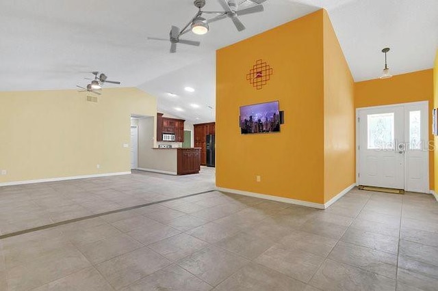9319 Woodbreeze Blvd, Windermere, FL 34786 - entrance foyer featuring ceiling fan, baseboards, and high vaulted ceiling