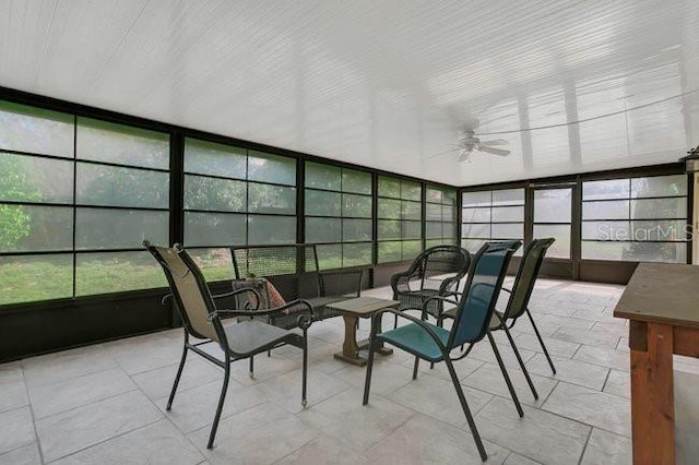 9319 Woodbreeze Blvd, Windermere, FL 34786 - sunroom with a ceiling fan, an outdoor living space, and tile patterned floors
