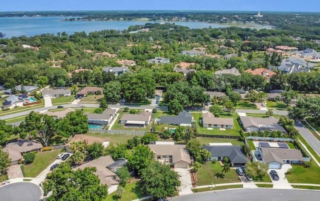 9319 Woodbreeze Blvd, Windermere, FL 34786 - aerial perspective of suburban area featuring a large body of water