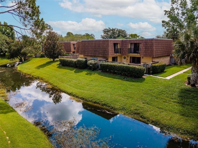 5287 Cypress Ct Unit 724, Orlando, FL 32811 - view of subject property featuring a large body of water