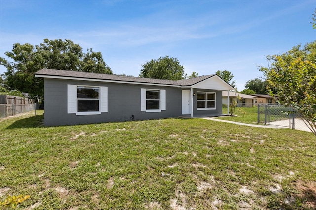 325 Little Aspen Ct, Ocoee, FL 34761 - ranch-style house with a gate and concrete block siding