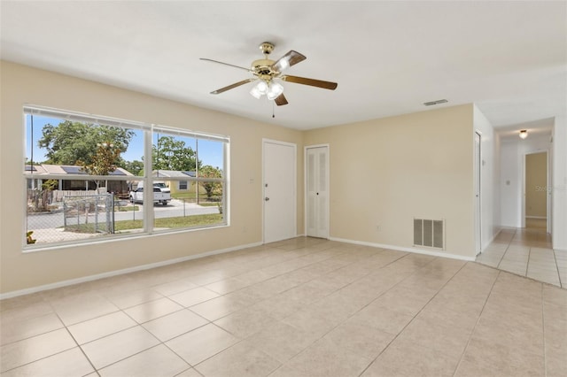 325 Little Aspen Ct, Ocoee, FL 34761 - spare room with healthy amount of natural light, a ceiling fan, and tile patterned flooring