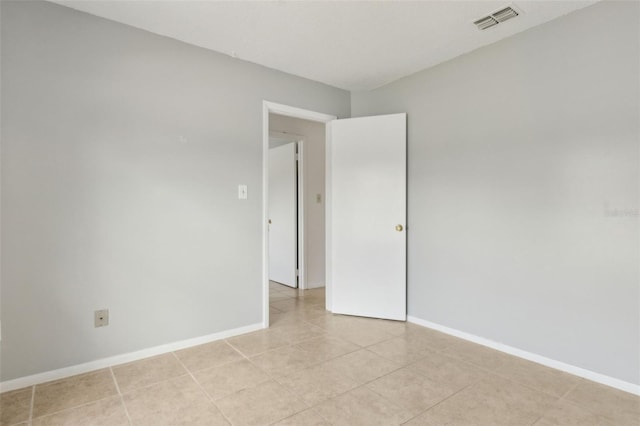 325 Little Aspen Ct, Ocoee, FL 34761 - spare room featuring light tile patterned floors and baseboards