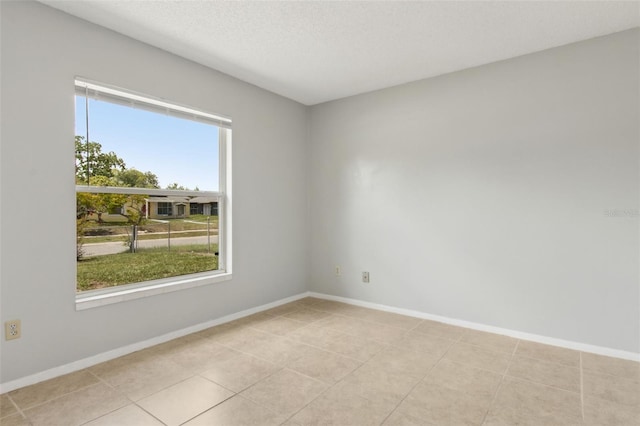 325 Little Aspen Ct, Ocoee, FL 34761 - spare room featuring baseboards and light tile patterned floors
