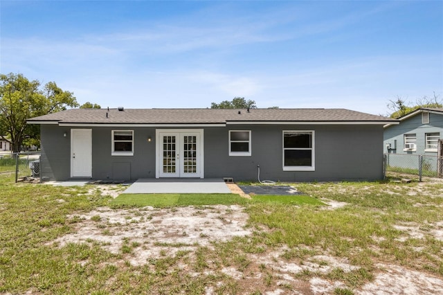 325 Little Aspen Ct, Ocoee, FL 34761 - rear view of house featuring french doors and a patio area