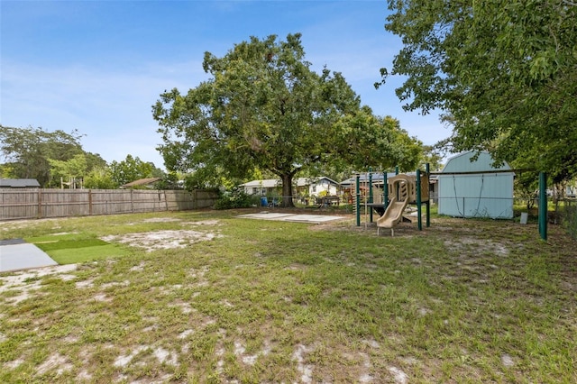 325 Little Aspen Ct, Ocoee, FL 34761 - fenced backyard with a playground