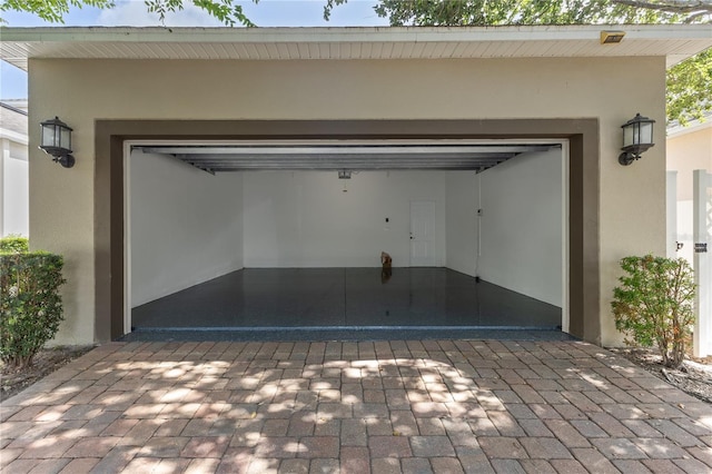 15229 Evergreen Oak Loop, Winter Garden, FL 34787 - garage with decorative driveway