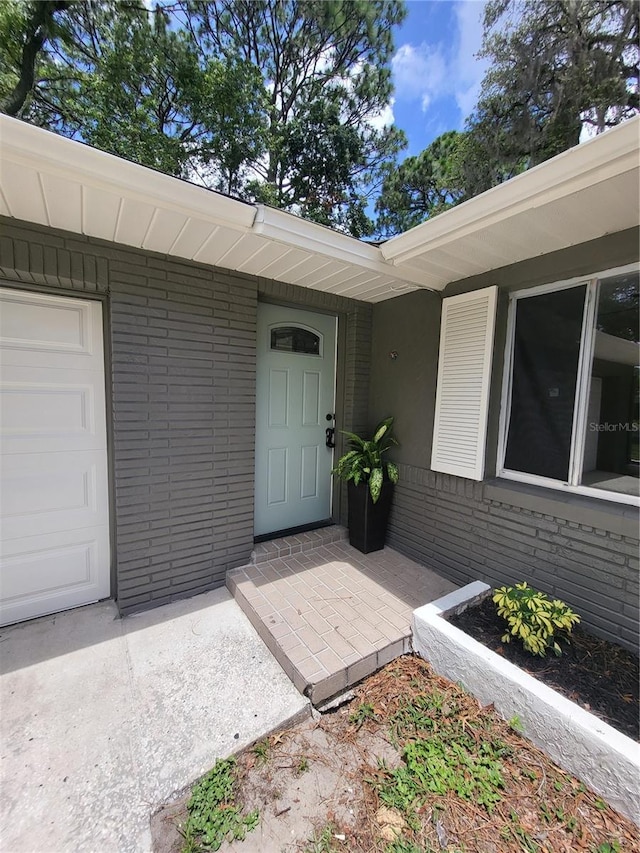 4883 Cherokee Rose Dr, Orlando, FL 32808 - property entrance featuring brick siding