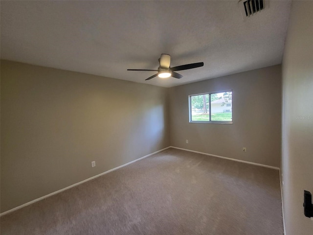 4883 Cherokee Rose Dr, Orlando, FL 32808 - carpeted empty room with a ceiling fan and baseboards