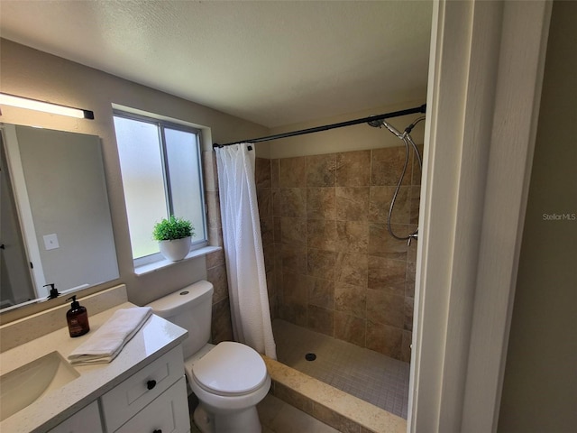 4883 Cherokee Rose Dr, Orlando, FL 32808 - full bathroom featuring vanity, toilet, and a tile shower