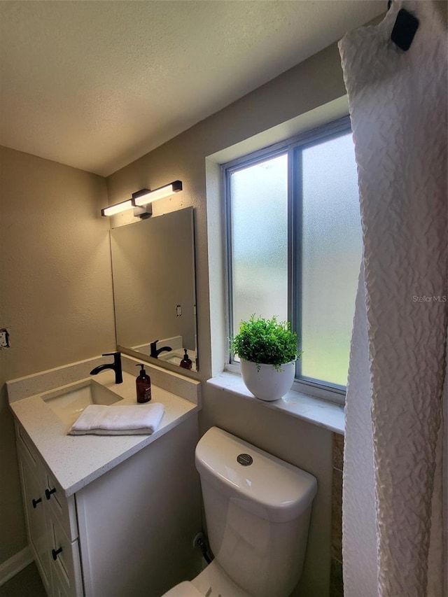 4883 Cherokee Rose Dr, Orlando, FL 32808 - bathroom with vanity and toilet