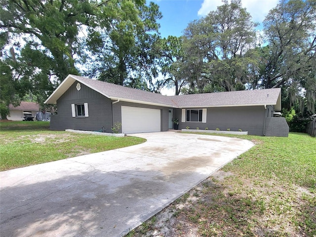 4883 Cherokee Rose Dr, Orlando, FL 32808 - ranch-style house featuring a garage, a front lawn, concrete driveway, and brick siding