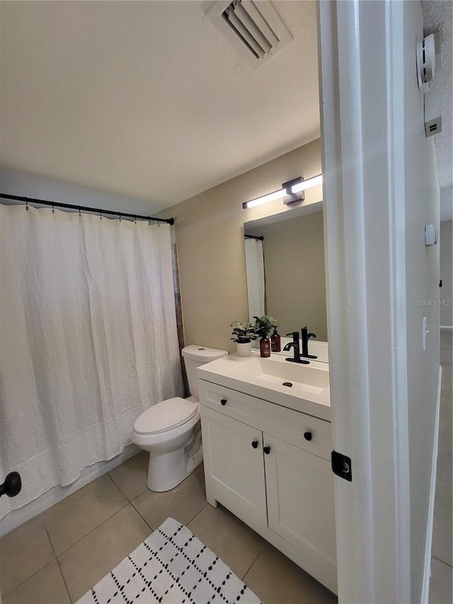 4883 Cherokee Rose Dr, Orlando, FL 32808 - bathroom with vanity and tile patterned floors
