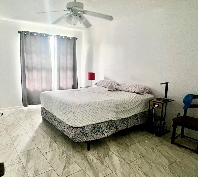 1815 Townhall Ln Unit 1815, Orlando, FL 32807 - bedroom featuring light marble finish floors and ceiling fan