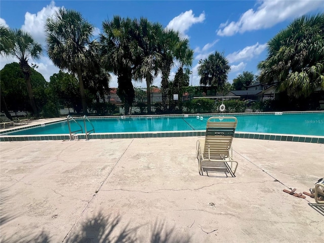 1815 Townhall Ln Unit 1815, Orlando, FL 32807 - community pool with a patio
