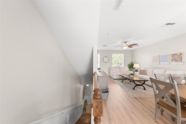 8024 Cool Breeze Dr Unit 132, Orlando, FL 32819 - living room featuring light wood-type flooring and ceiling fan